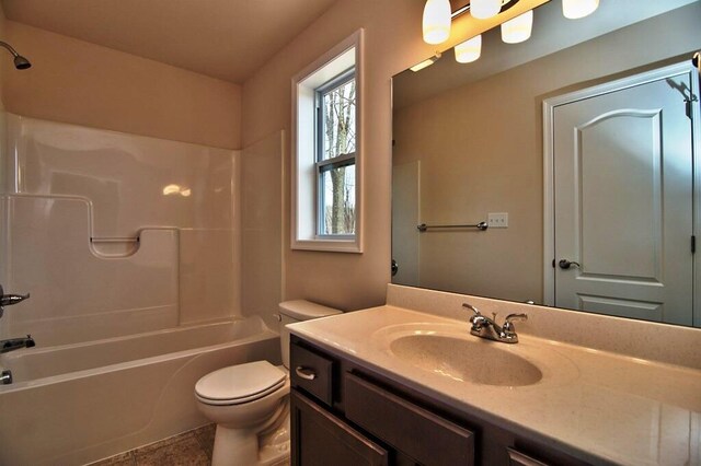 411 Pierce Ln, East Stroudsburg, PA 18301 - bathroom featuring toilet, vanity, and shower / tub combination