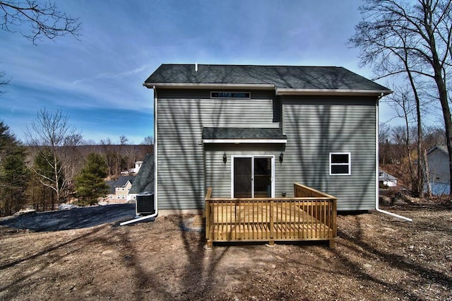 411 Pierce Ln, East Stroudsburg, PA 18301 - back of house featuring a wooden deck, central AC unit, and a shingled roof