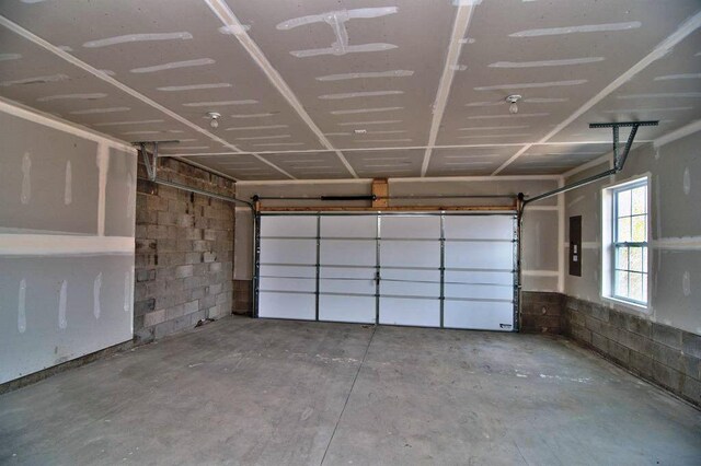 411 Pierce Ln, East Stroudsburg, PA 18301 - garage with electric panel and concrete block wall