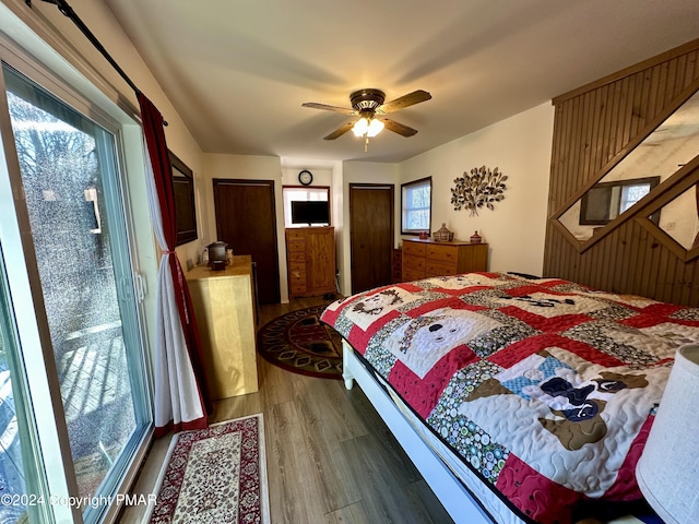 bedroom featuring ceiling fan and wood finished floors