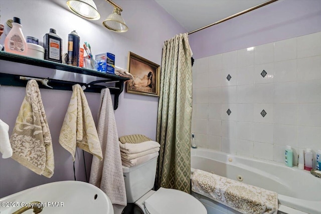 bathroom with shower / bath combo and toilet