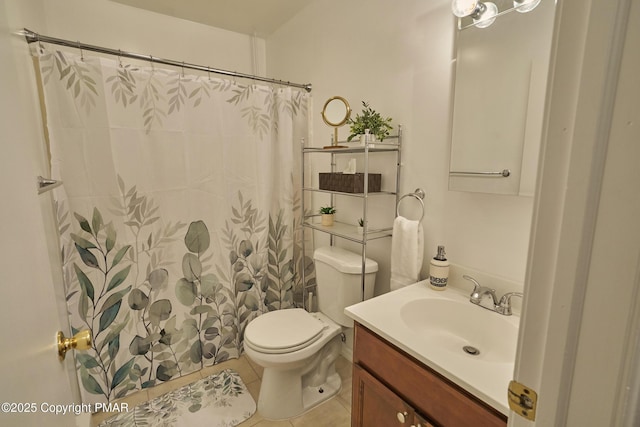 full bath featuring tile patterned flooring, a shower with shower curtain, vanity, and toilet