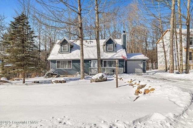 cape cod house with a garage