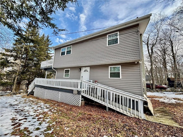 view of front of property with a balcony