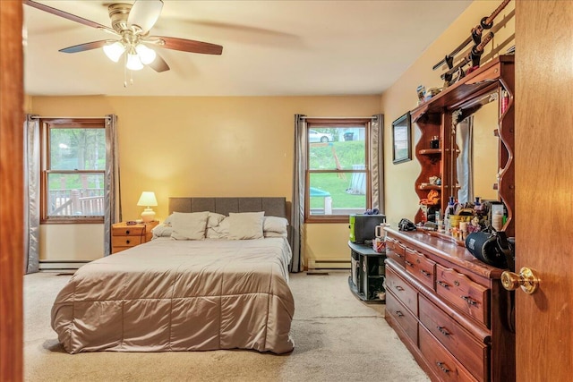 225 Northpark Dr W, East Stroudsburg, PA 18302 - bedroom featuring light colored carpet, a baseboard radiator, and a ceiling fan