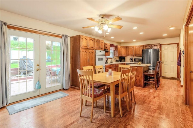 225 Northpark Dr W, East Stroudsburg, PA 18302 - dining room with light wood-style floors, a ceiling fan, french doors, and recessed lighting