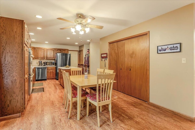 225 Northpark Dr W, East Stroudsburg, PA 18302 - dining room with light wood-type flooring, ceiling fan, recessed lighting, and baseboards