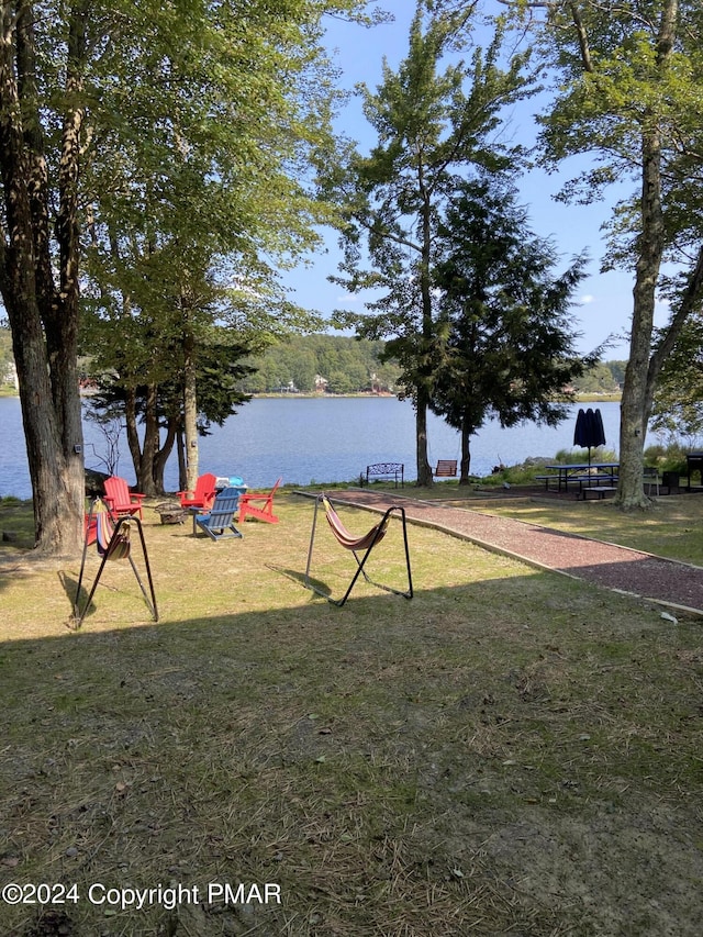 view of yard with a water view