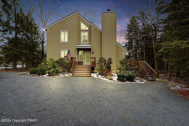 view of front of property featuring a chimney