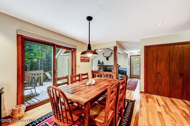 dining area with light wood finished floors