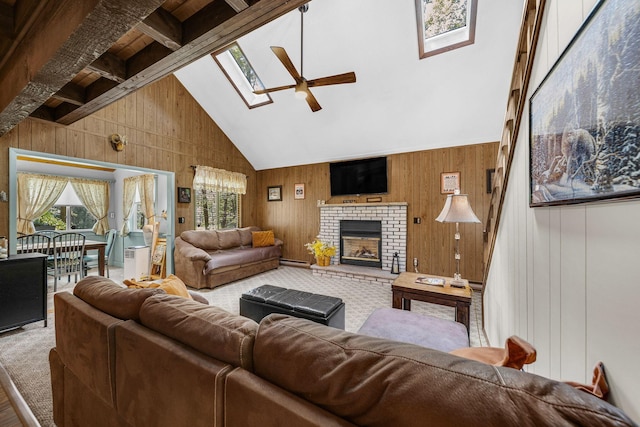 38 N Fairway Dr, Lake Ariel, PA 18436 - living area with a skylight, a ceiling fan, beamed ceiling, high vaulted ceiling, and wood walls