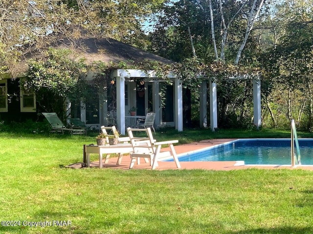 outdoor pool with a lawn