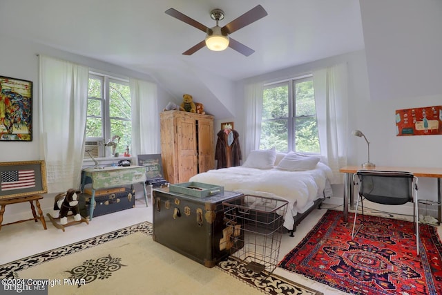 bedroom with vaulted ceiling and ceiling fan