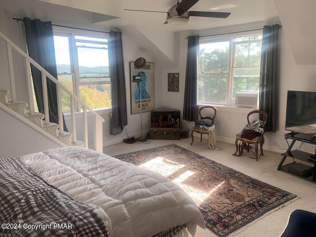 bedroom featuring ceiling fan and carpet floors