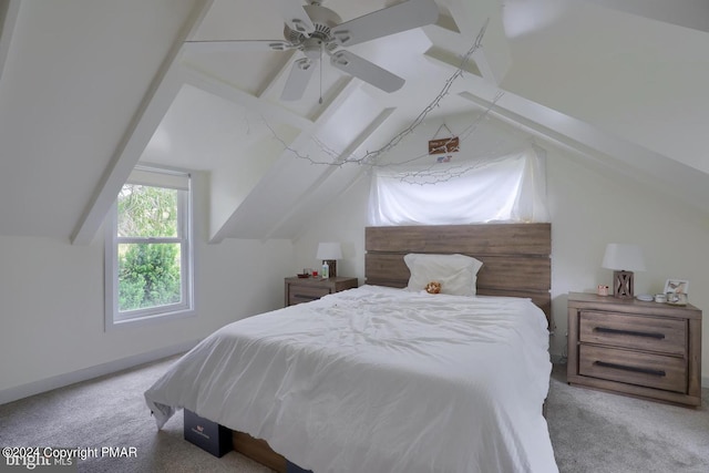 bedroom featuring carpet floors, baseboards, and lofted ceiling