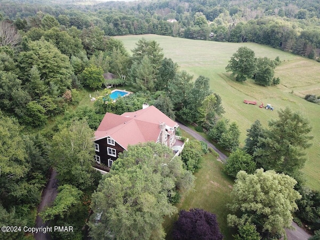 bird's eye view with a rural view and a forest view