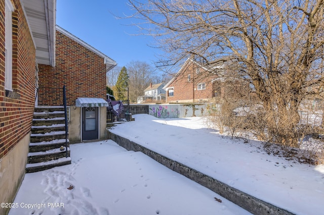 view of snowy yard