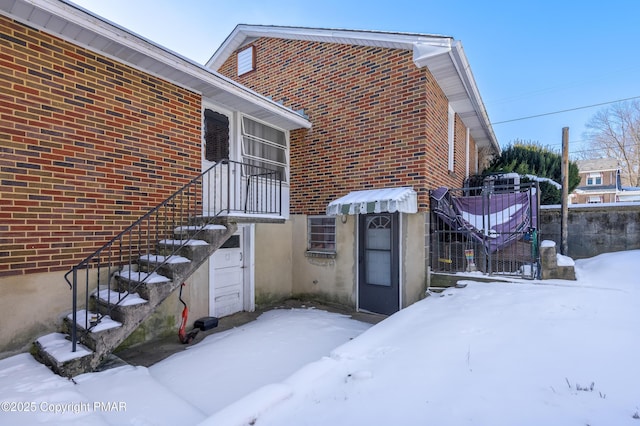 view of snow covered property