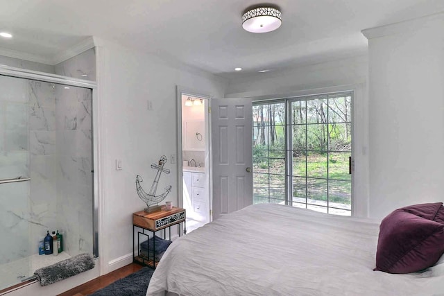 bedroom featuring dark wood-style flooring, access to outside, ensuite bathroom, baseboards, and ornamental molding