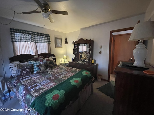 bedroom featuring ceiling fan and carpet flooring