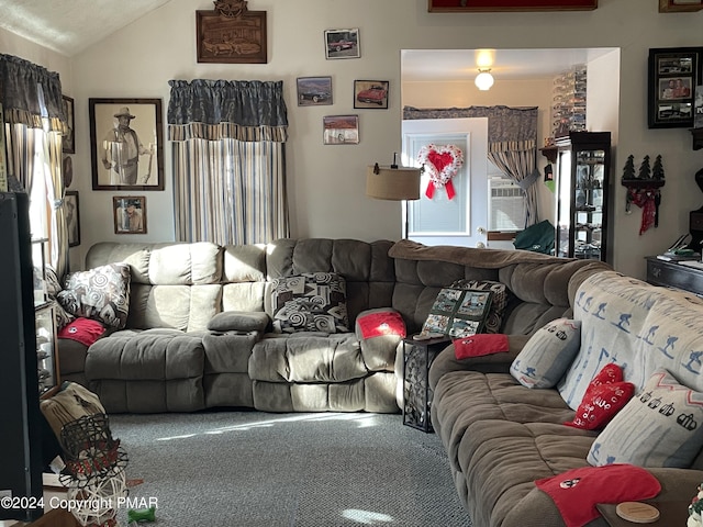 carpeted living room featuring plenty of natural light