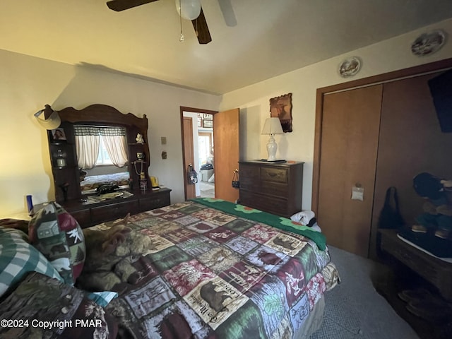 bedroom featuring ceiling fan and a closet