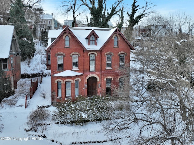 view of front of house with brick siding