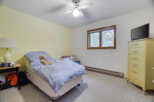 151 Forest Dr, Canadensis, PA 18325 - carpeted bedroom featuring baseboard heating and a ceiling fan