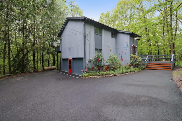 151 Forest Dr, Canadensis, PA 18325 - view of outdoor structure with driveway and an attached garage