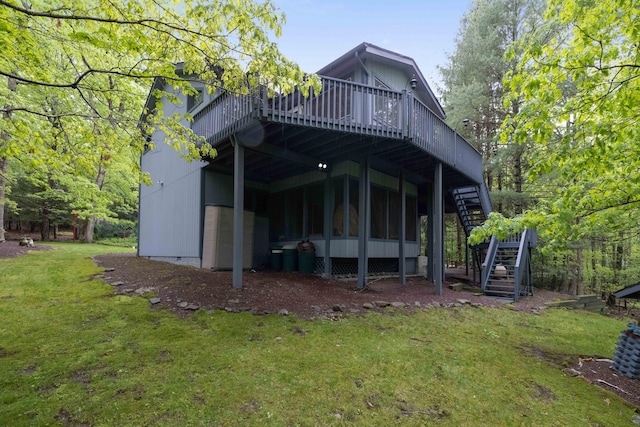 151 Forest Dr, Canadensis, PA 18325 - back of property with stairs, a wooden deck, and a yard