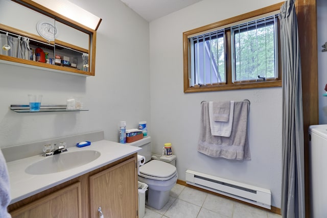 151 Forest Dr, Canadensis, PA 18325 - full bathroom with a baseboard radiator, toilet, vanity, tile patterned flooring, and baseboards