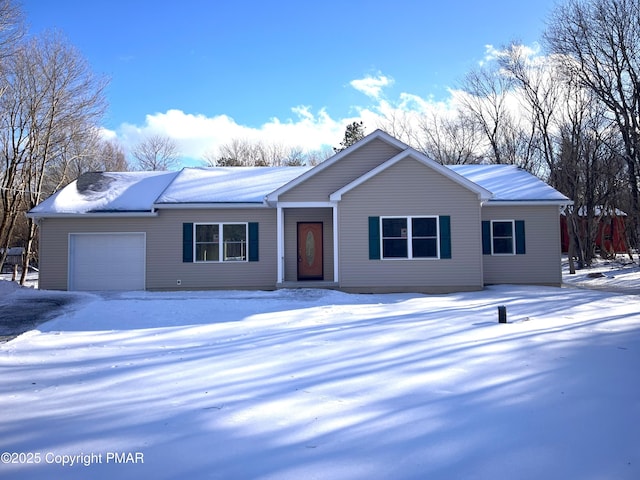 single story home featuring a garage