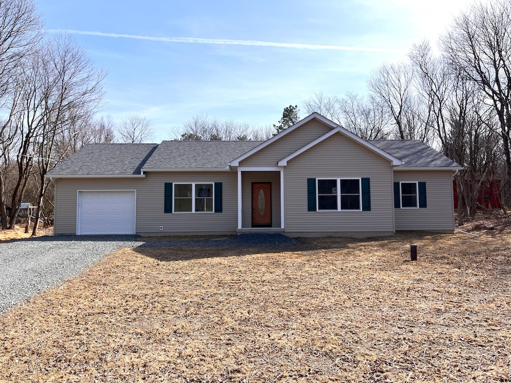 680 Stony Mountain Rd, Albrightsville, PA 18210 - ranch-style house featuring a garage, gravel driveway, and a shingled roof