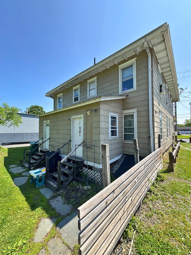 375 N Courtland St, East Stroudsburg, PA 18301 - back of property with entry steps and a yard