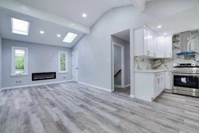 1005 Country Place Dr, Coolbaugh Township, PA 18466 - unfurnished living room with a skylight, plenty of natural light, recessed lighting, and light wood-style floors