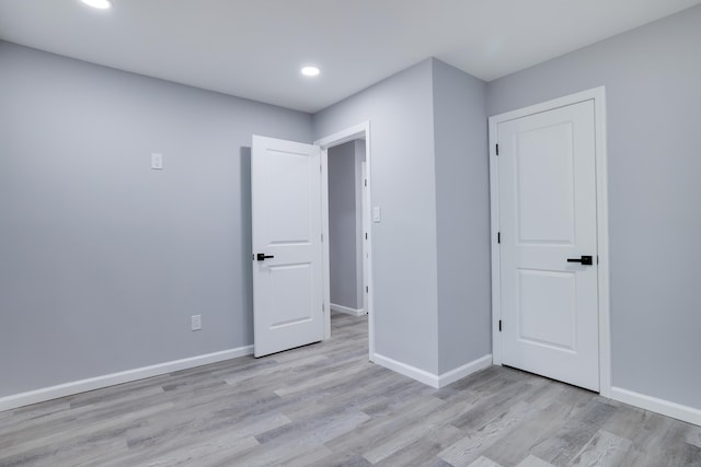 1005 Country Place Dr, Coolbaugh Township, PA 18466 - unfurnished bedroom featuring light wood finished floors, recessed lighting, and baseboards