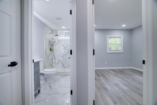 1005 Country Place Dr, Coolbaugh Township, PA 18466 - bathroom featuring a marble finish shower, vanity, toilet, baseboards, and recessed lighting