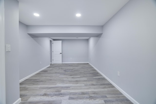 1005 Country Place Dr, Coolbaugh Township, PA 18466 - finished below grade area with baseboards, wood finished floors, and recessed lighting
