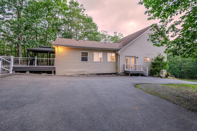 5104 Lake Dr, East Stroudsburg, PA 18301 - view of front facade with a gazebo, driveway, and roof with shingles