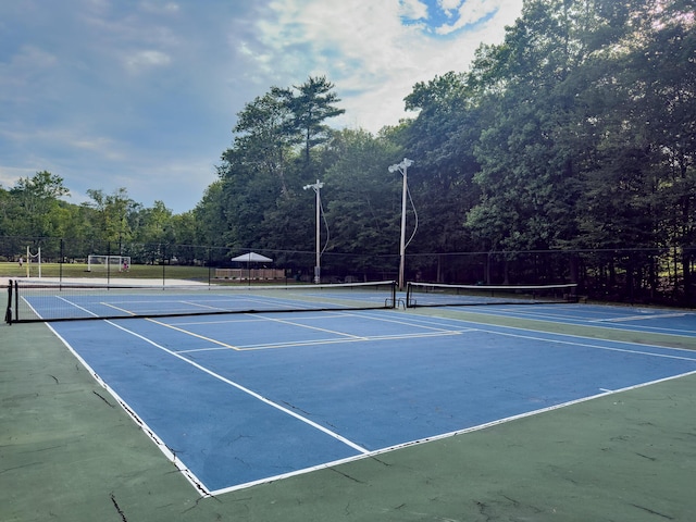 5104 Lake Dr, East Stroudsburg, PA 18301 - view of tennis court featuring community basketball court and a view of trees