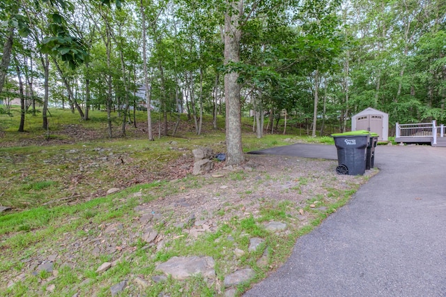 5104 Lake Dr, East Stroudsburg, PA 18301 - view of yard featuring a storage shed