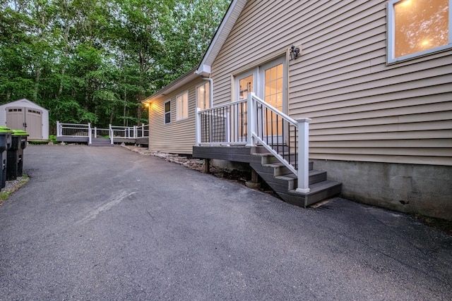 5104 Lake Dr, East Stroudsburg, PA 18301 - view of side of property with a storage shed