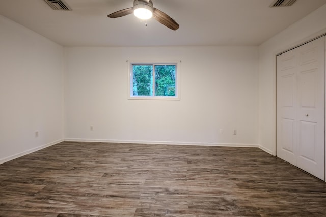 5104 Lake Dr, East Stroudsburg, PA 18301 - unfurnished bedroom with dark wood-style floors, a closet, and a ceiling fan