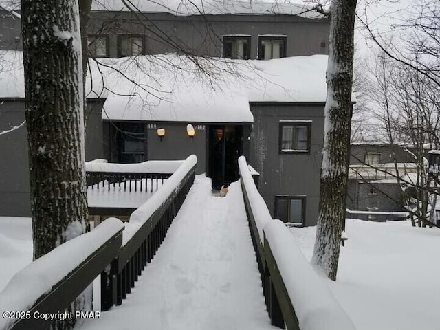 view of front of house featuring stucco siding