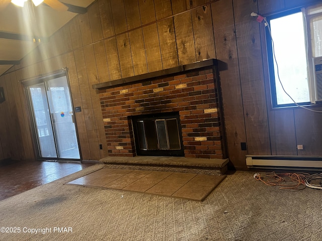 room details with a brick fireplace, a baseboard heating unit, and wood walls