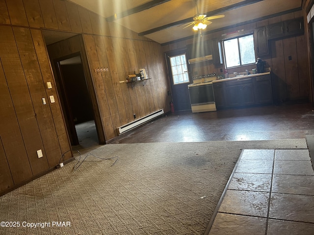 kitchen with wooden walls, a ceiling fan, a baseboard radiator, light countertops, and a baseboard heating unit