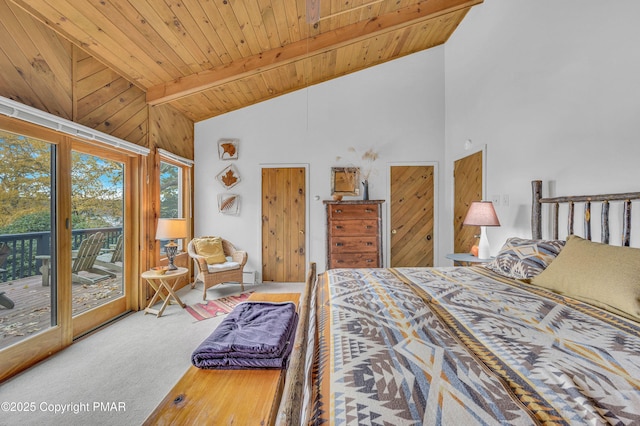 bedroom with carpet flooring, beam ceiling, access to outside, and wood ceiling