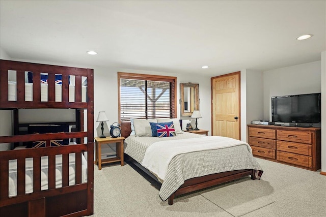 carpeted bedroom featuring recessed lighting