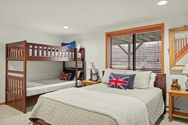 carpeted bedroom with recessed lighting and baseboards