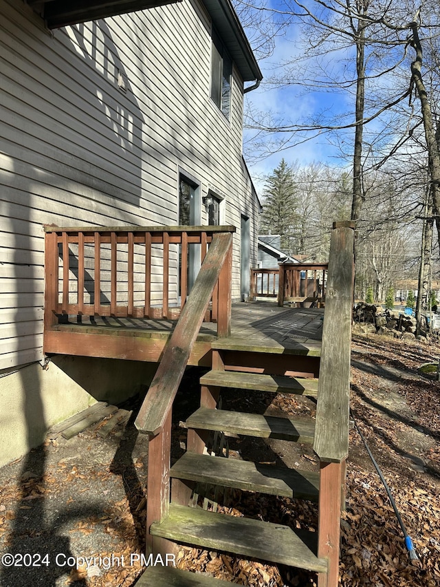 wooden deck with stairs